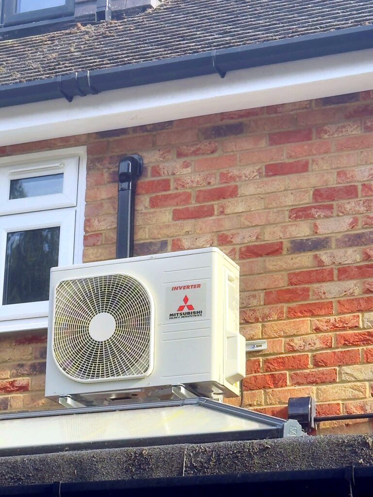 Mitsubishi inverter unit on a flat roof – Airhive UK